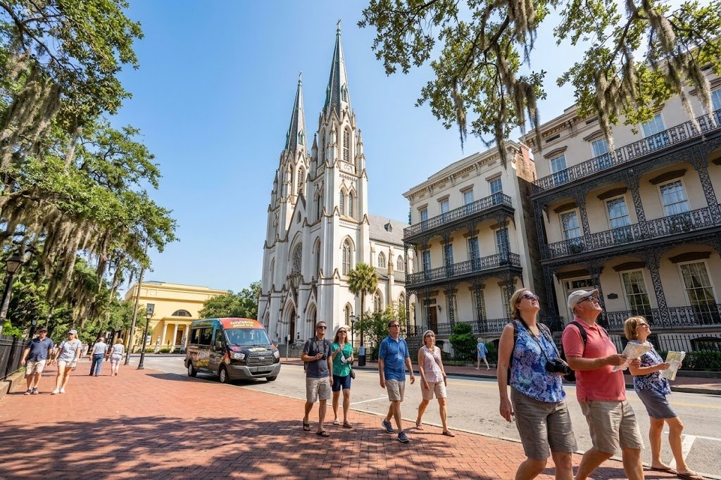 Tourists exploring historic southern architecture looking for the best way to see Savannah